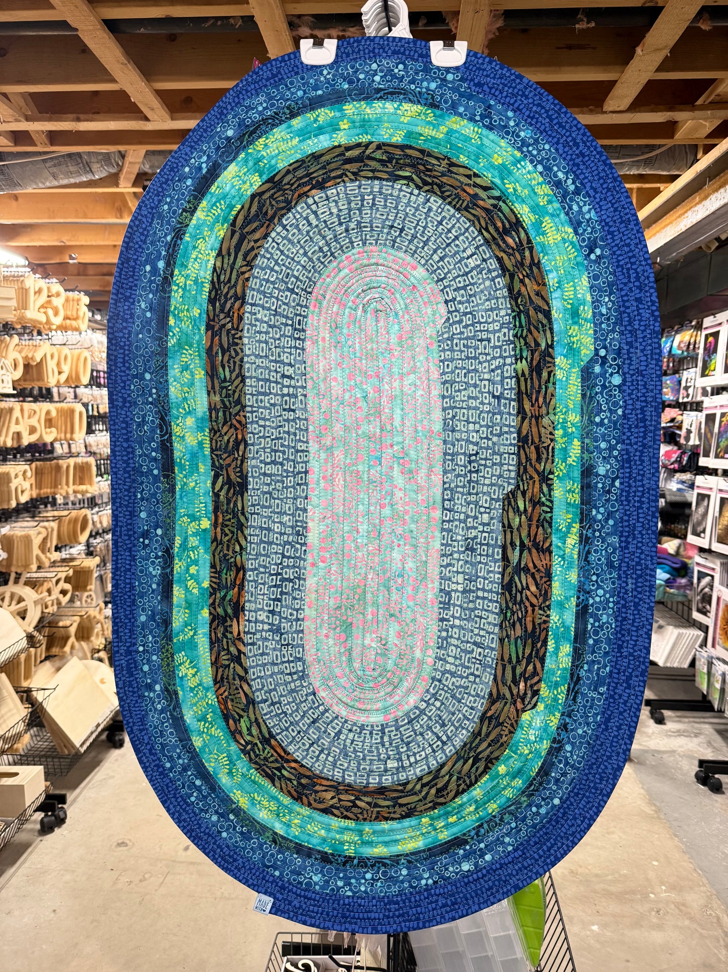 Jelly Roll Rug Teal and Blue  28” x44”
